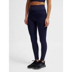 Damskie legginsy bezszwowe Hummel Define. Niebieskie legginsy sportowe Hummel, bez wzorów, na jogę i pilates. Za 191.00 zł.
