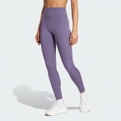 Legginsy Own the Run 7/8. Fioletowe legginsy Adidas, l, bez wzorów, z materiału. Za 279.00 zł.
