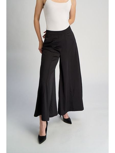 Marks & Spencer Spodnie w kolorze czarnym rozmiar: 36. Czarne spodnie materiałowe Marks & Spencer, bez wzorów, z materiału, z podwyższonym stanem. Za 61.17 zł.