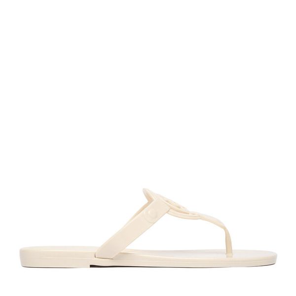 Japonki Nine West. Białe klapki Nine West, bez wzorów, bez obcasa. Za 79.99 zł.