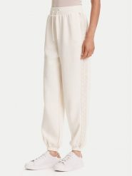 Guess Spodnie dresowe V5YB02 KB3P2 Écru Regular Fit. Spodnie dresowe Guess, m, z aplikacjami, z dresówki. Za 219.99 zł.