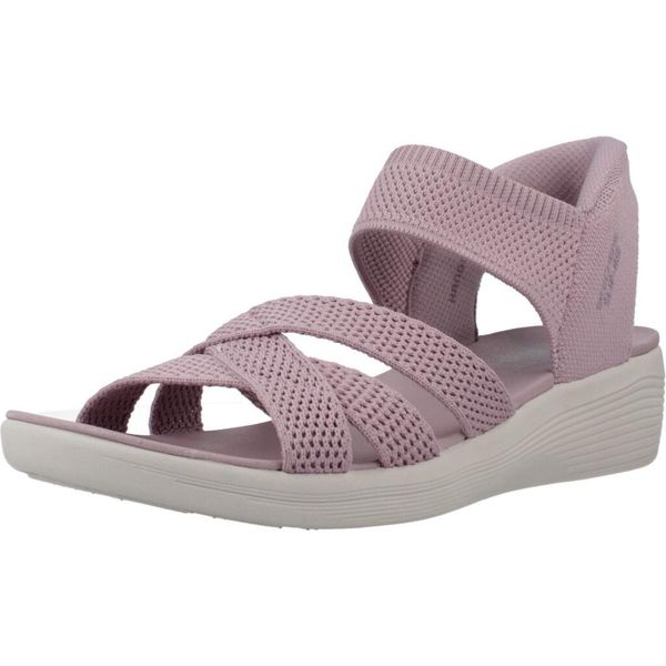 Sandały SKECHERS SLIP-INS ARYA Fioletowy. Fioletowe sandały Skechers, bez wzorów, z materiału, bez obcasa, bez zapięcia. Za 390.00 zł.