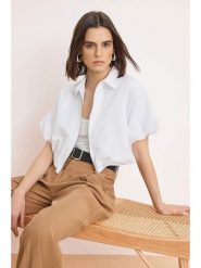 Trendyol Bluzka w kolorze białym rozmiar: 38. Białe bluzki Trendyol, bez wzorów, bez kołnierzyka, bez ramiączek. Za 86.99 zł.