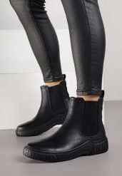 Czarne Botki Sztyblety na Ozdobnie Żłobionej Podeszwie Ezisane. Czarne botki Born2be, bez wzorów, z jeansu, bez obcasa, na płaskiej podeszwie, bez zapięcia. Za 129.99 zł.