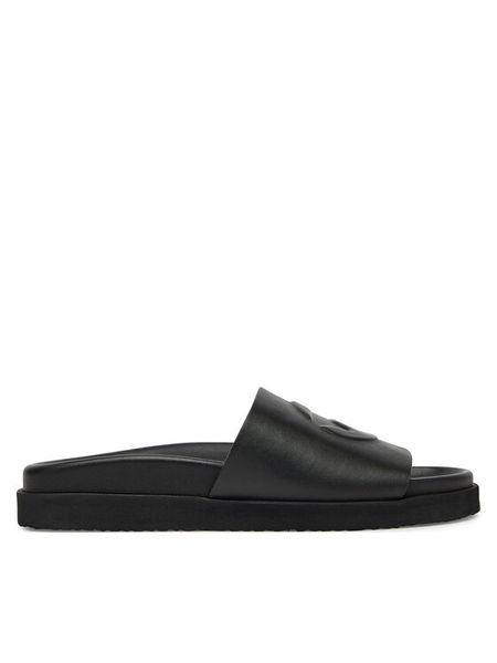 G-Star Raw Klapki CARLA-25SS496 Czarny. Czarne klapki G-Star, bez wzorów, ze skóry, bez obcasa. Za 221.99 zł.