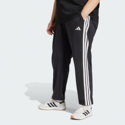 Spodnie Essentials 3-Stripes French Terry Cuffed. Białe obuwie sportowe Adidas, xl, bez wzorów, z materiału, na fitness i siłownię. W wyprzedaży za 114.50 zł.