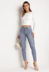 Jasnoniebieskie Jeansy Skinny z Bawełny Ozdobione Złotą Farbą Taidda. Niebieskie jeansy Born2be, l, z aplikacjami. Za 129.99 zł.