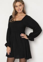 Czarna Rozkloszowana Sukienka z Elastyczną Górą i Falbankami przy Rękawach Saviella. Czarne sukienki Born2be, na co dzień, bez wzorów, z jeansu, eleganckie, bez kołnierzyka, bez ramiączek, mini, rozkloszowane. Za 59.99 zł.