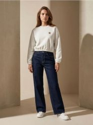 Bawełniane jeansy wide straight leg - niebieski. Niebieskie jeansy Sinsay, bez wzorów. Za 49.99 zł.