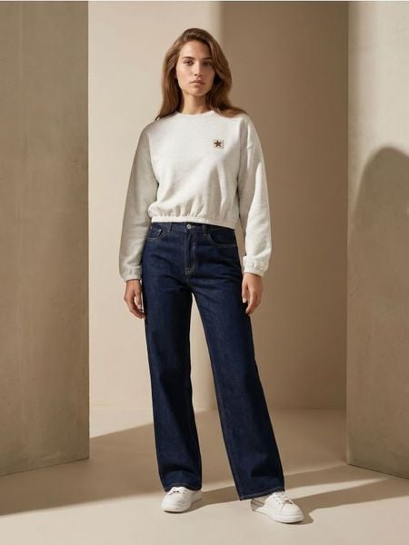 Bawełniane jeansy wide straight leg - niebieski. Niebieskie jeansy Sinsay, bez wzorów. Za 49.99 zł.
