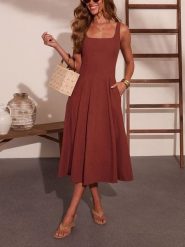 Milan Kiss Sukienka w kolorze brązowym rozmiar: L. Brązowe sukienki Milan Kiss, l, bez wzorów, bez kołnierzyka, bez ramiączek, midi. Za 239.95 zł.