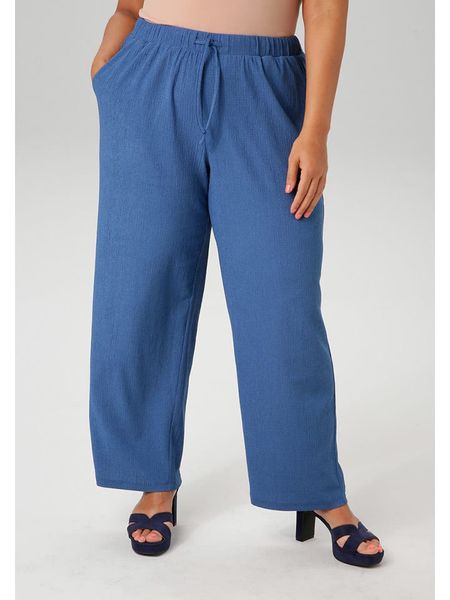 Aniston Spodnie w kolorze niebieskim rozmiar: 50. Niebieskie spodnie materiałowe Aniston, bez wzorów, z materiału, z podwyższonym stanem. Za 52.42 zł.