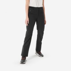 Spodnie turystyczne damskie Quechua SH500 Warm. Czarne spodnie sportowe QUECHUA, na zimę, xs, bez wzorów, z materiału, trekkingowe. Za 249.99 zł.