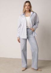 Niebieskie Bawełniane Jeansy o Szerokim Kroju z Wysokim Stanem Jendrea. Niebieskie jeansy Born2be, l, bez wzorów, z podwyższonym stanem. Za 129.99 zł.