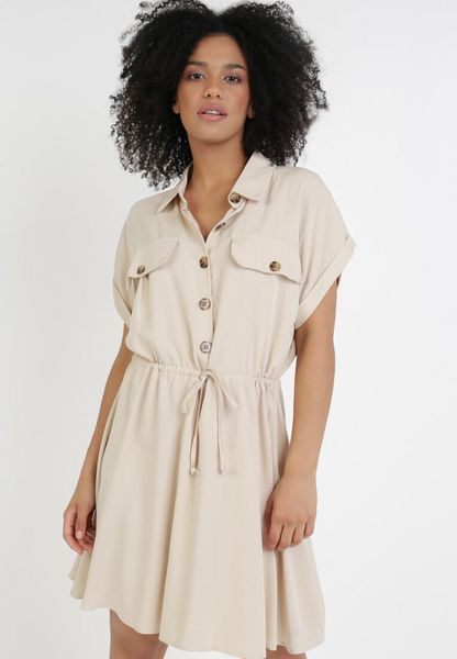 Jasnobeżowa Sukienka Priaphelous. Brązowe sukienki Born2be, l, bez wzorów, z bawełny, bez kołnierzyka, bez ramiączek, mini, koszulowe. Za 99.99 zł.