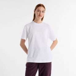 Koszulka damska New Balance WT41501WT – biała. Białe bluzki New Balance, s, bez wzorów, z materiału, eleganckie, bez kołnierzyka, bez ramiączek. Za 169.99 zł.