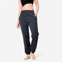 Spodnie dresowe damskie Domyos Gym & Pilates. Szare spodnie dresowe DOMYOS, xs, bez wzorów, z bawełny, na fitness i siłownię. Za 109.99 zł.