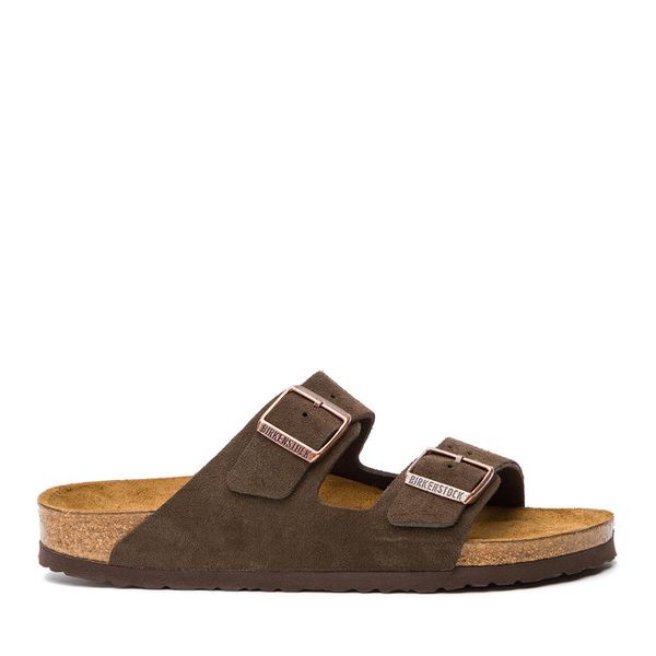 Klapki Birkenstock. Brązowe klapki Birkenstock, bez wzorów, z zamszu, bez obcasa. Za 569.99 zł.