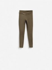 Gładkie legginsy - ciemnozielony. Zielone legginsy Reserved, l, bez wzorów, z dzianiny. Za 89.99 zł.