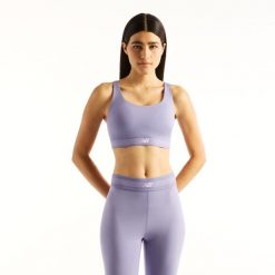 Biustonosz do treningu New Balance AC WB61Q0QKDSV – fioletowy. Fioletowe bielizna sportowa New Balance, l, bez wzorów, z materiału. Za 219.99 zł.