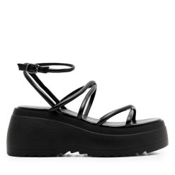 Sandały Jenny Fairy. Czarne sandały Jenny Fairy, bez wzorów, bez obcasa, na koturnie, bez zapięcia. Za 169.99 zł.