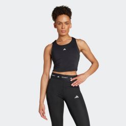 Koszulka fitness damska ADIDAS bez rękawów. Koszulki sportowe Adidas, bez wzorów, ze skóry, bez ramiączek, na fitness i siłownię. Za 139.99 zł.