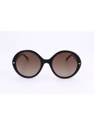 Carolina Herrera Damskie okulary przeciwsłoneczne w kolorze czarno-brązowym rozmiar: 55. Brązowe okulary przeciwsłoneczne Carolina Herrera, bez wzorów, z tworzywa sztucznego. Za 259.95 zł.