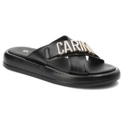 Czarne Klapki Carinii Modne Buty Damskie. Czarne klapki Carinii, bez wzorów, z materiału, bez obcasa. Za 399.00 zł.