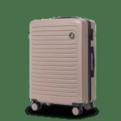 Walizka ŚREDNIA Wings ABS+ COOT 24" Champagne. Brązowe walizki Wings, bez wzorów, średnie. Za 149.90 zł.