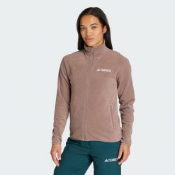 Bluza polarowa Multi Essentials z suwakiem na całej długości. Brązowe bluzy Adidas, l, bez wzorów, z materiału, bez kaptura. Za 219.00 zł.