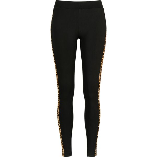 Damskie klasyczne legginsy w paski. Czarne legginsy Urban Classics, bez wzorów. Za 149.50 zł.
