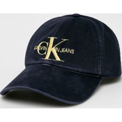 Calvin Klein Jeans - Czapka. Białe czapki Calvin Klein Jeans, bez wzorów, z bawełny. W wyprzedaży za 119.90 zł.