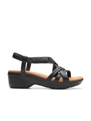 Clarks Skórzane sandały "Tuleah May" w kolorze czarnym na obcasie rozmiar: 39. Czarne sandały Clarks, bez wzorów, z otwartym noskiem, bez obcasa, na koturnie, bez zapięcia. Za 158.47 zł.