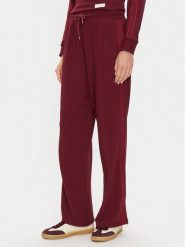 Tommy Hilfiger Spodnie dresowe UW0UW04771 Bordowy Relaxed Fit. Czerwone spodnie dresowe TOMMY HILFIGER, xl, bez wzorów, z dresówki. Za 199.99 zł.