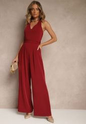 Bordowy Kombinezon o Taliowanym Kroju z Dekoltem Halter i Wiązanym Paskiem Malisena. Czerwone sukienki Renee, na co dzień, l, bez wzorów, eleganckie, bez kołnierzyka, bez ramiączek. Za 104.99 zł.