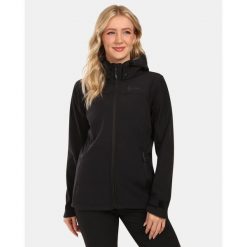 Damska kurtka softshell Kilpi RAVIA-W. Czarne kurtki sportowe Kilpi, bez wzorów, z softshellu, bez kaptura, trekkingowe. Za 473.69 zł.