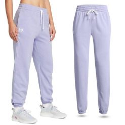 Spodnie dresowe damskie Under Armour Rival Terry Joggers joggery. Fioletowe spodnie dresowe Under Armour, m, bez wzorów, z dresówki. W wyprzedaży za 240.10 zł.
