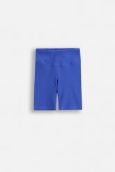 Legginsy prążkowane z nogawką do kolan. Niebieskie legginsy COCCODRILLO, m, bez wzorów, z bawełny, krótkie. W wyprzedaży za 29.90 zł.