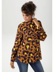 Aniston Bluzka w kolorze karmelowo-żółtym rozmiar: 38. Brązowe bluzki Aniston, bez wzorów, z wiskozy, bez kołnierzyka, bez ramiączek. Za 61.17 zł.