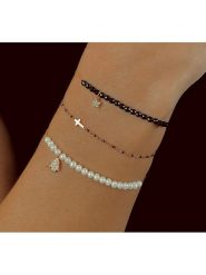 Les Petites Précieuses Pozłacana bransoletka z cyrkoniami rozmiar: onesize. Czarne bransoletki Les Petites Précieuses, z cyrkonią, pozłacane. Za 78.95 zł.