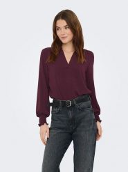 ONLY Bluzka w kolorze bordowym rozmiar: L. Czerwone bluzki Only, l, bez wzorów, bez kołnierzyka, bez ramiączek. Za 129.95 zł.