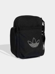 Adidas Torebka w kolorze czarnym - 16 x 18 x 6 cm rozmiar: onesize. Czarne torby na ramię Adidas, bez wzorów, z materiału, na ramię, bez dodatków. Za 78.95 zł.
