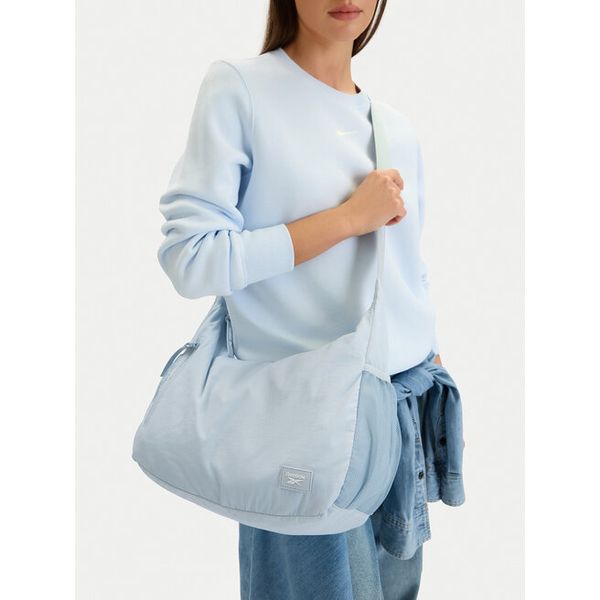Torebka Reebok. Niebieskie torebki klasyczne Reebok, bez wzorów, bez dodatków. Za 89.99 zł.