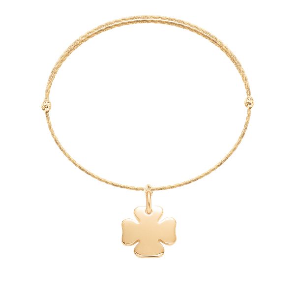 Bransoletka z pozłacaną koniczyną na cienkim złotym sznurku premium. Żółte bransoletki Lilou, pozłacane. Za 148.00 zł.