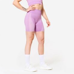 Spodenki fitness cardio damskie Domyos seamless. Czerwone obuwie sportowe DOMYOS, z materiału, bez zapięcia, na fitness i siłownię. W wyprzedaży za 59.99 zł.