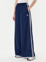 Adidas Spodnie dresowe adicolor Satin JD0881 Granatowy Wide Leg. Niebieskie spodnie dresowe Adidas, bez wzorów, z dresówki. Za 349.99 zł.