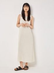 Apricot Sukienka w kolorze kremowym rozmiar: XS. Brązowe sukienki Apricot, na co dzień, xs, bez wzorów, bez kołnierzyka, bez ramiączek, maxi, proste. Za 86.99 zł.