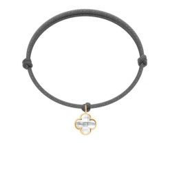 Bransoletka z pozłacaną koniczyną z białym kryształem na ciemnoszarym sznurku. Białe bransoletki Lilou, pozłacane. Za 99.00 zł.