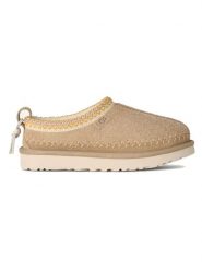 UGG Skórzane kapcie "Tasman Biarritz" w kolorze beżowym rozmiar: 38. Brązowe obuwie domowe UGG, bez wzorów, ze skóry, bez zapięcia. Za 653.95 zł.