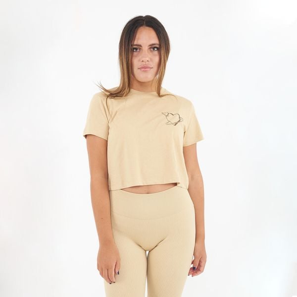 Koszulka crop z bawełny SPECIAL beżowa. Brązowe bluzki LEGEA, bez wzorów, z bawełny, sportowe, bez kołnierzyka, bez ramiączek. Za 43.00 zł.